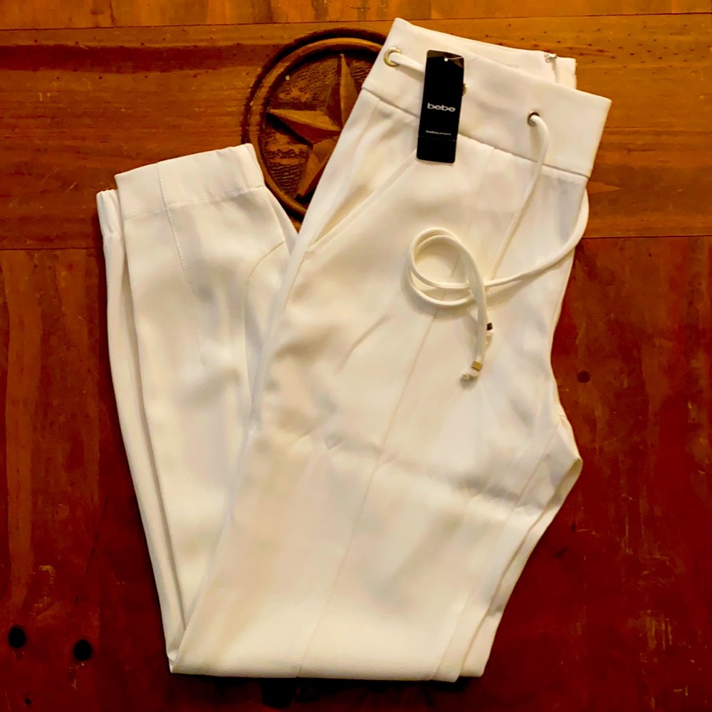 COPY - White BEBE relaxed eyelet pants. Originall…
